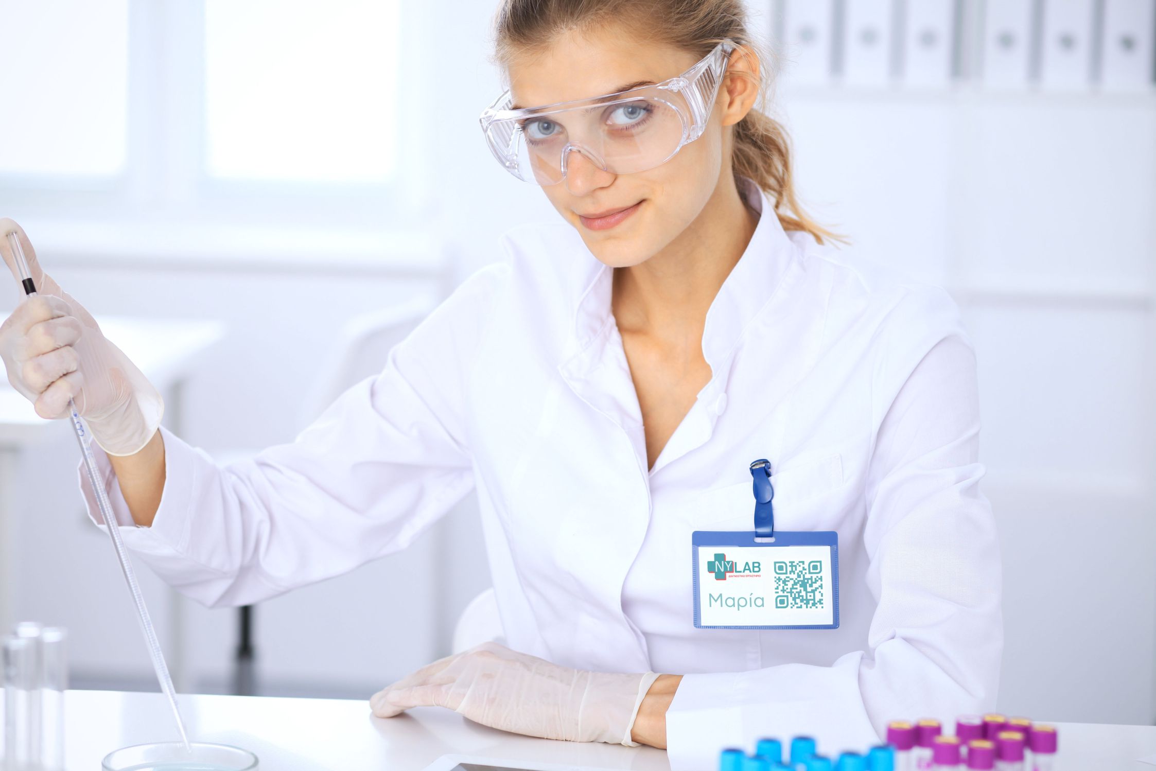 Female scientific researcher or blood test assistant in laboratory. Medicine concept.